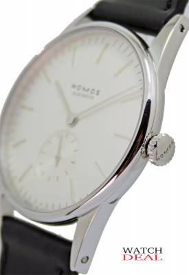 Nomos Glashütte Orion White Manual Winding Exhibition Case Back 35mm 306 ✓ Luxury watches from Nomos Glashütte at fair prices ✓ No platform ✓ Personal delivery ✓ Telephone advice ✓ Watchdeal has luxury watches at low prices for over 30 years ✓
