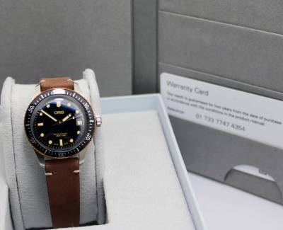 Luxury watches from Oris at fair prices -  Watchdeal has luxury watches at low prices for over 30 years -